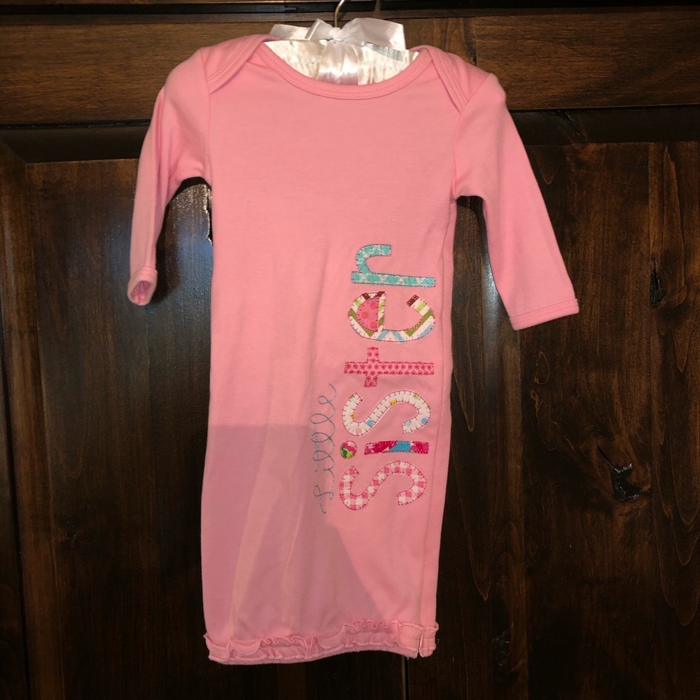 Custom appliqué “little sister” gown.